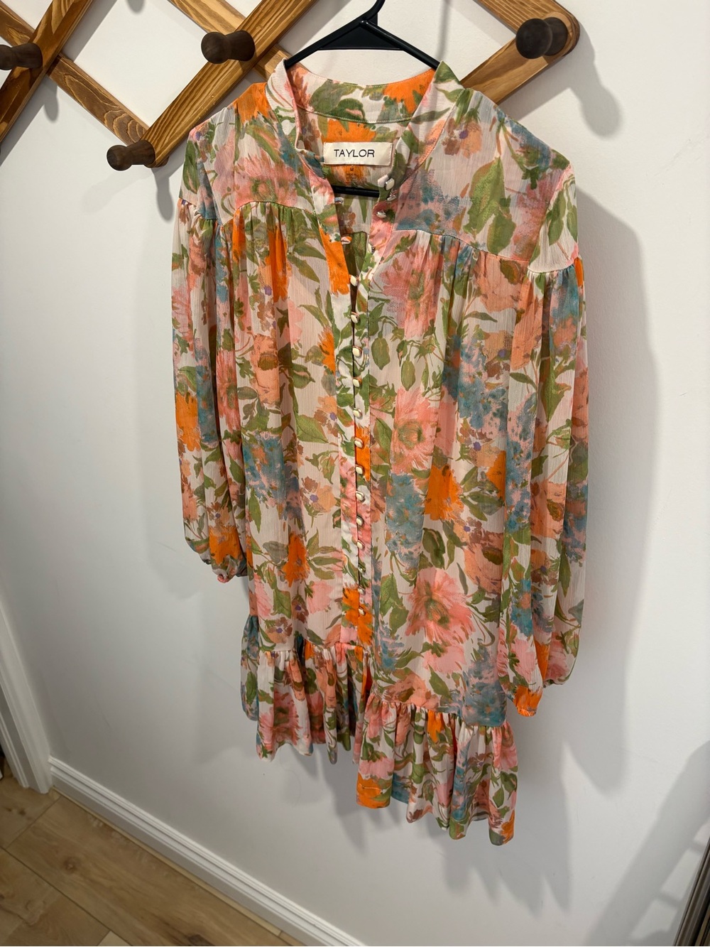 Taylor brand mini dress features a vibrant floral print and flowy bishop sleeves - Picture 2 of 8